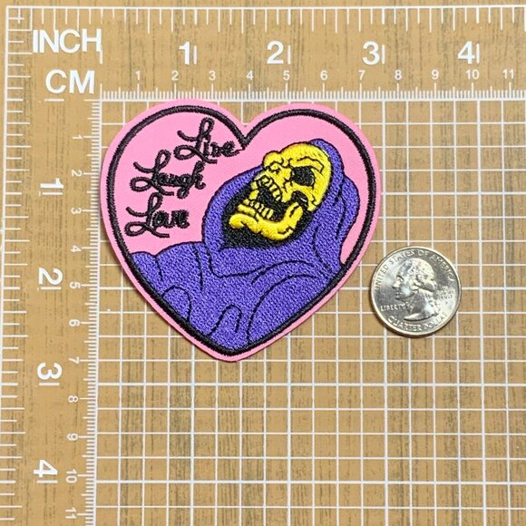 Skeletor Live Laugh Love Iron on Embroidered Patch Pink Purple Heart Shaped - Picture 2 of 4